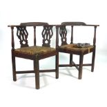 A pair of 18th century and later elm and ash corner chairs on square straight legs joined by cross