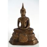 A bronze figure modelled as The Buddha, h. 23.5 cm CONDITION REPORT: Casting of poor quality, some