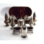 A parcel of silver and metalware cruets of varying styles and designs, various dates and makers