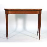 A Sheraton-style satinwood, walnut and crossbanded fold over card table on square tapering legs with