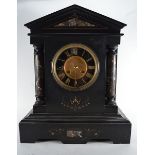 A Victorian striking mantle clock, the dial inscribed John Bull, contained in a slate and marble