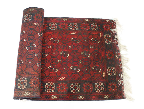 A Turkoman-style runner of Tekke design, the red ground within a matching border, 300 x 80 cm - Image 4 of 8