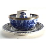 A Spode charger transfer printed in the chinoiserie manner, d. 34 cm and two items of willow pattern