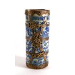 A Qianlong blue and white metalware mounted cylindrical brush pot, signed to base with a four
