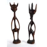A pair of Malain carved fertility figures, h. 30 cm CONDITION REPORT: Minor wear, no major losses