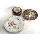 A Dresden two handled plate centrally decorated with a floral spray, w. 28 cm, a Dresden cabinet