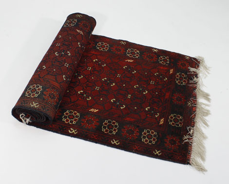 A Turkoman-style runner of Tekke design, the red ground within a matching border, 300 x 80 cm - Image 2 of 8