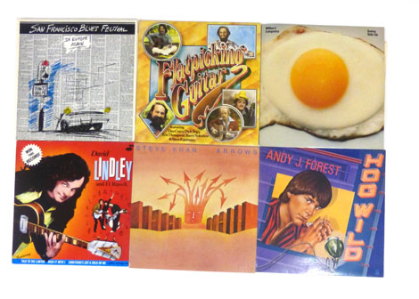 Approximately three hundred and fifty LP records of varying genres including George Harrison, Joe