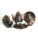 A part twelve sitting Japanese eggshell tea service, each piece decorated with a female figure and