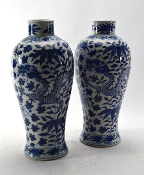 A pair of 19th Chinese century blue and white vases of slender baluster form decorated with dragons, - Image 2 of 6