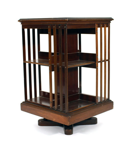 An Edwardian mahogany revolving bookcase of typical form, w. 50 cm CONDITION REPORT: Some losses