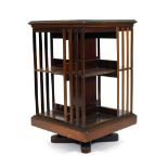 An Edwardian mahogany revolving bookcase of typical form, w. 50 cm CONDITION REPORT: Some losses