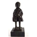 A bronzed cast metal figure of a boy at ease on a marble plinth, h. 23 cm CONDITION REPORT: