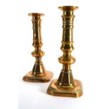 A pair of 19th century brass ejector-type candlesticks, h. 21.5 cm CONDITION REPORT: Normal wear,