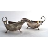 A pair of George II-style silver sauce boats, makers mark indistinct, London 1910, 6 ozs CONDITION