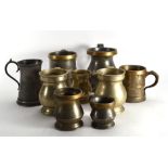 A group of Victorian and later pewter including four brass mounted measuring tankards CONDITION