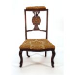 A 19th century mahogany, inlaid and part upholstered nursing chair CONDITION REPORT: Rickety,