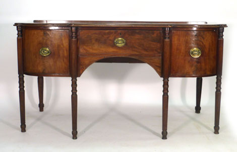 A George III mahogany bow fronted sideboard, the central drawer flanked by two doors on turned and - Image 2 of 3