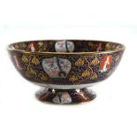 A Masons Ironstone footed bowl decorated in the Imari palette with traditional scenes, d. 25 cm