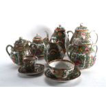An extensive early 20th century Cantonese famille verte tea service CONDITION REPORT: Some damage,
