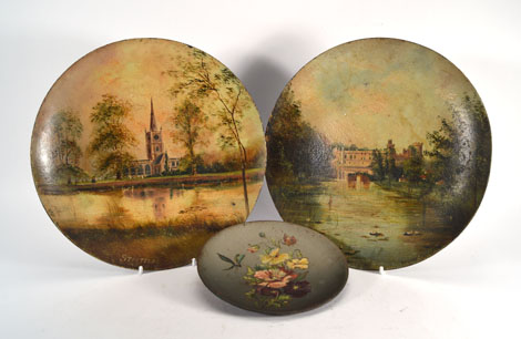 F. C. Gill, a pair of painted tole chargers depicting Warwick Castle and Stratford-on-Avon church, - Image 2 of 3