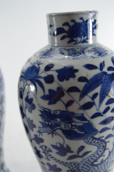 A pair of 19th Chinese century blue and white vases of slender baluster form decorated with dragons, - Image 6 of 6