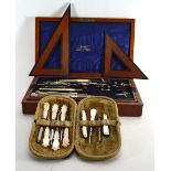 A Victorian mother of pearl manicure set in a fitted case together with a cased geometry set