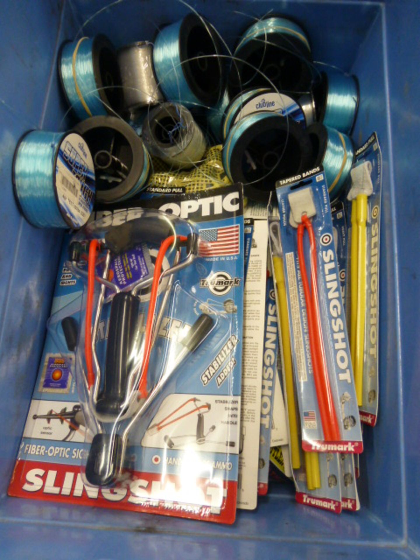 Quantity of slingshot, bait catapults and accessories together with various reels of club line