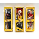 Three Pelham Puppets 'Policeman' and two 'Clowns', each in a yellow window box