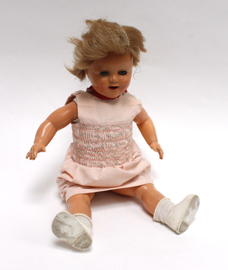 A 1950's French Raynal hard plastic fully jointed doll with flirty eyes and original shoes, h. 47