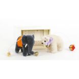 A Steiff hanging toy 'Elephant', blue mohair. h. 7.5 cm, boxed with certificate and another