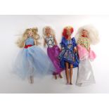 A group of seven Barbie and other plastic dolls and a small group of clothing and accessories