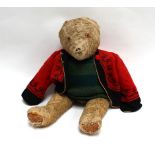 A 1930's/40's English century fully jointed bear in golden mohair with amber/black eyes, h. 60 cm