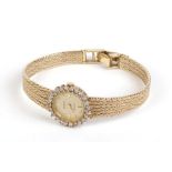 A 14ct yellow gold ladies cocktail wristwatch, the circular gold coloured dial with baton numerals