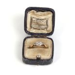 An 18ct yellow gold ring set nine diamonds in a diamond shaped setting,