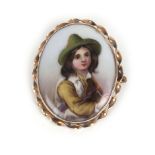 A Continental plaque of oval form hand painted with a head and shoulders portrait of a young boy in