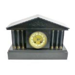 A Victorian mantel clock, the enamelled dial with Arabic numerals within a black slate case of