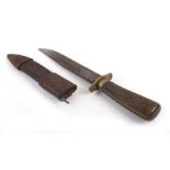 An early 20th century dagger and sheath, the blade marked Underwood CONDITION REPORT: Wear