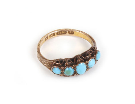 A 15ct yellow gold ring set five graduated turquoise within a scrolled setting, - Image 2 of 2