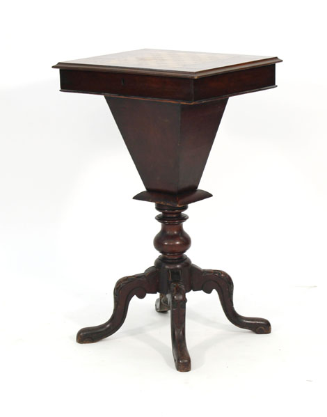 A 19th century walnut sewing table, the surface inlaid with a chess board on four splayed feet, w.