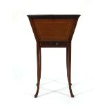 A late 19th century mahogany and strung sewing table with a single drawer on four square splayed