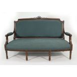 A late 19th century continental mahogany and upholstered parlour sofa on reeded legs CONDITION