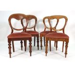 A harlequin set of six Victorian mahogany and upholstered balloon back dining chairs CONDITION