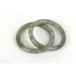 A pair of jade bangles internal d. 5.