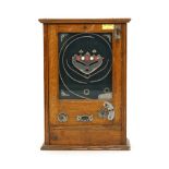 A mid-20th century oak cased half penny pinball machine, h. 66 cm CONDITION REPORT: Working order