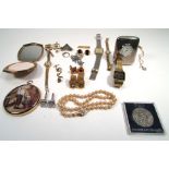 A small parcel of jewellery including wristwatches, cufflink,