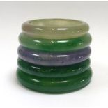 Five jade bangles, various colours, max d.