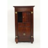 An Empire-style mahogany and gilt metal commode, the drawer above a tambour door and a lifting door,