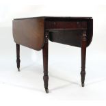 A 19th century mahogany Pembroke table on four turned legs with castors, l. 116 cm CONDITION REPORT: