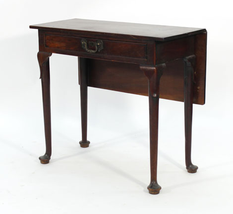 A 19th century mahogany drop-leaf side table, the single drawer over four tapering legs on pad feet,